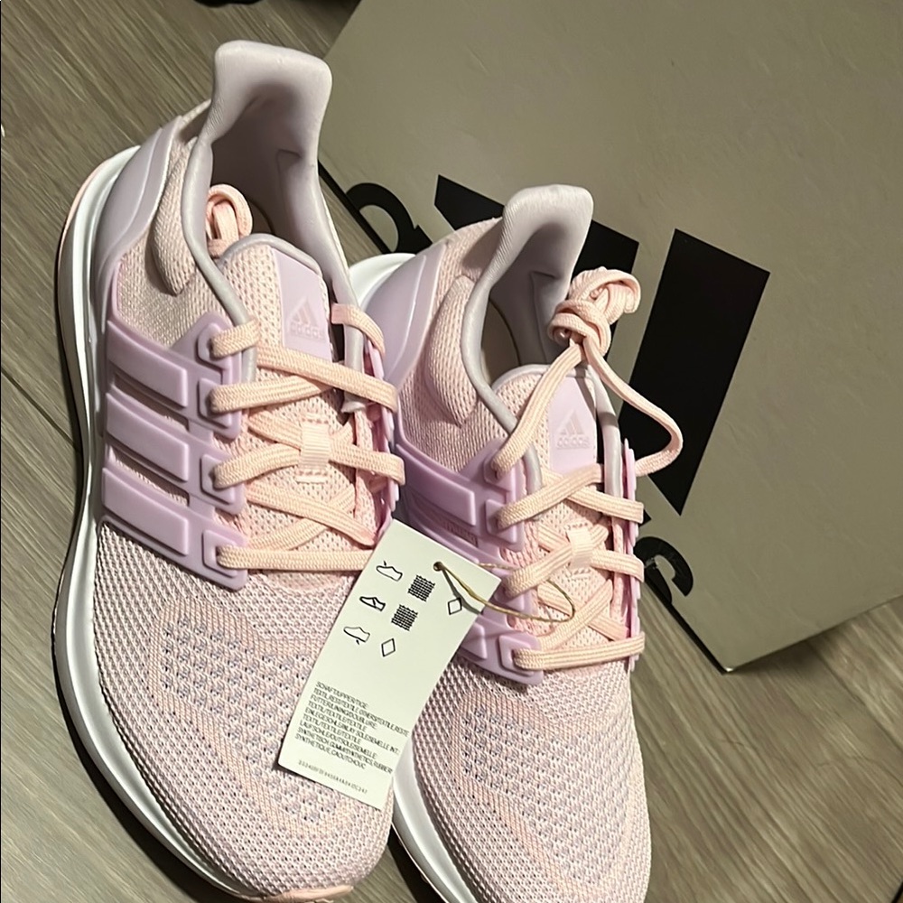 Adidas Pink Athletic Shoes with Mesh Upper and Signature Stripes size 6